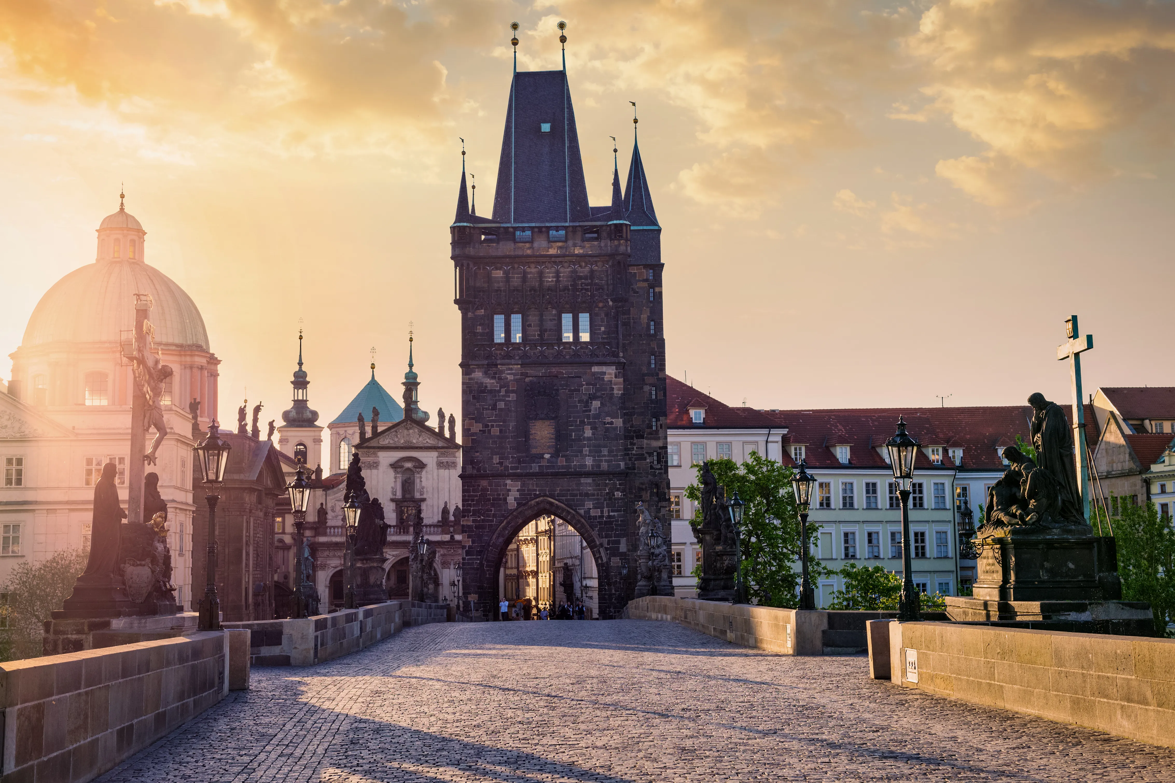 The Old Town Bridge Tower and Charles Bridge in Prague at dawn